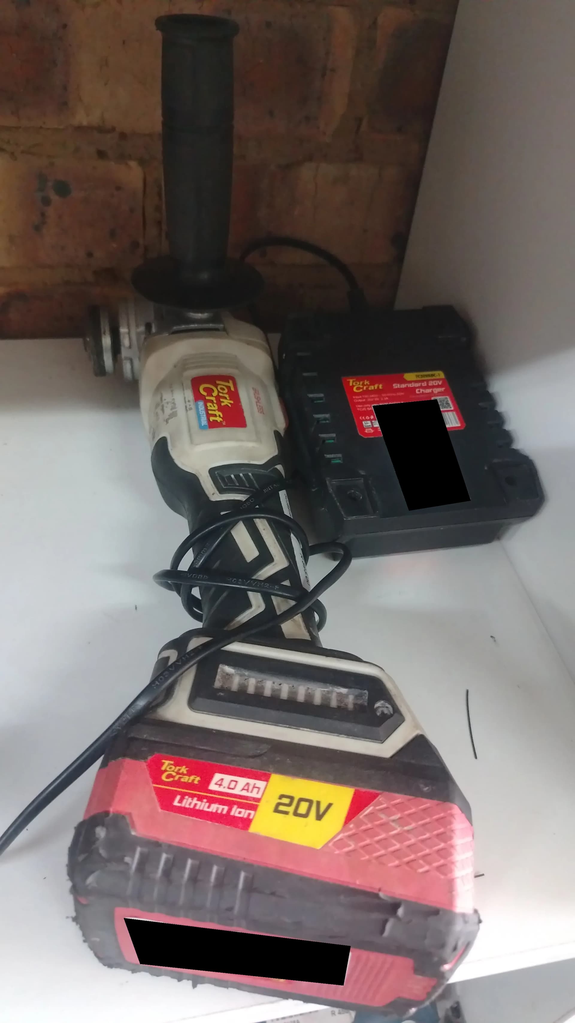 Used Tork Craft 20V angle grinder with battery and charger