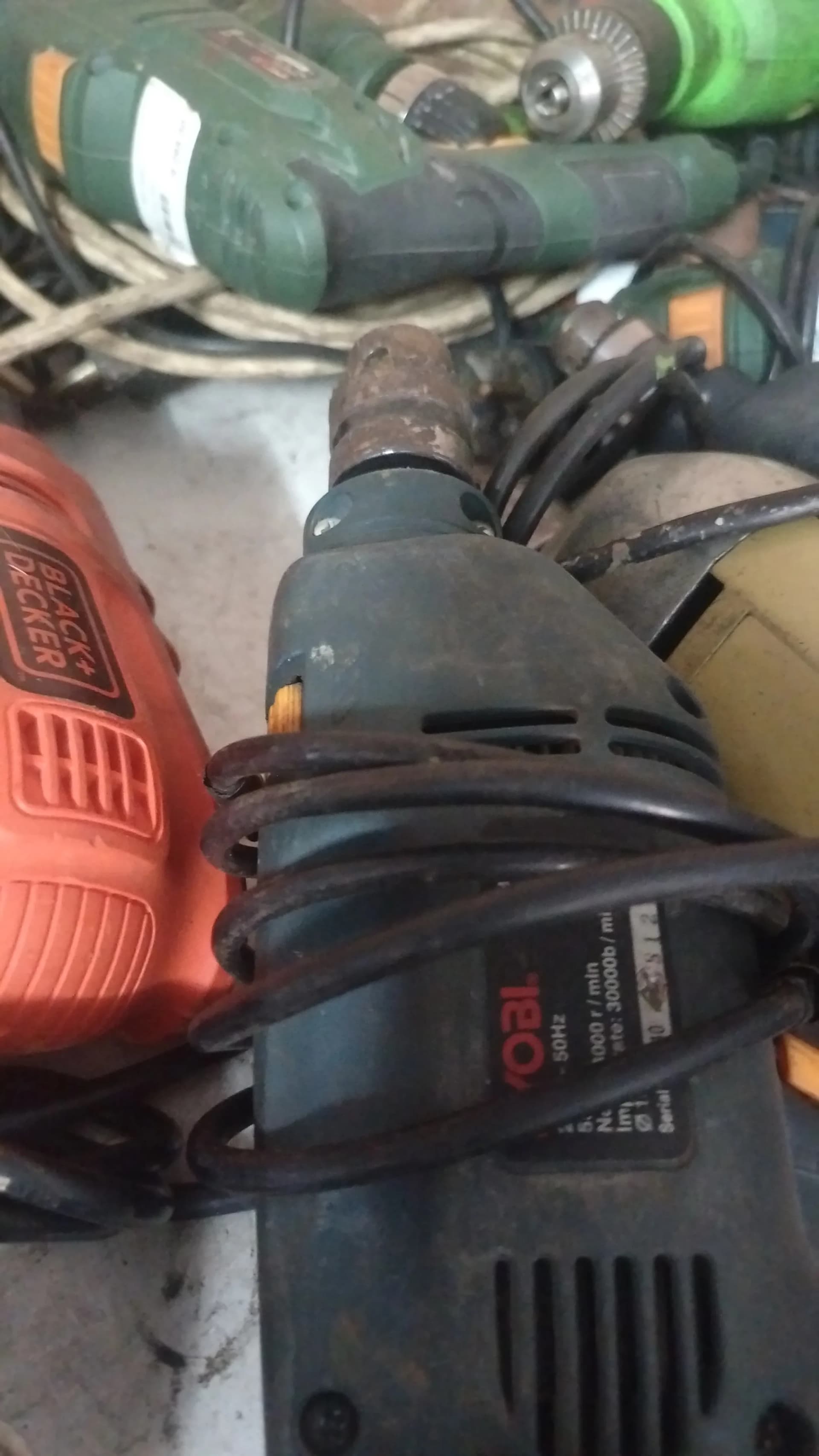 Chuck end of a used dirty Ryobi hammer drill