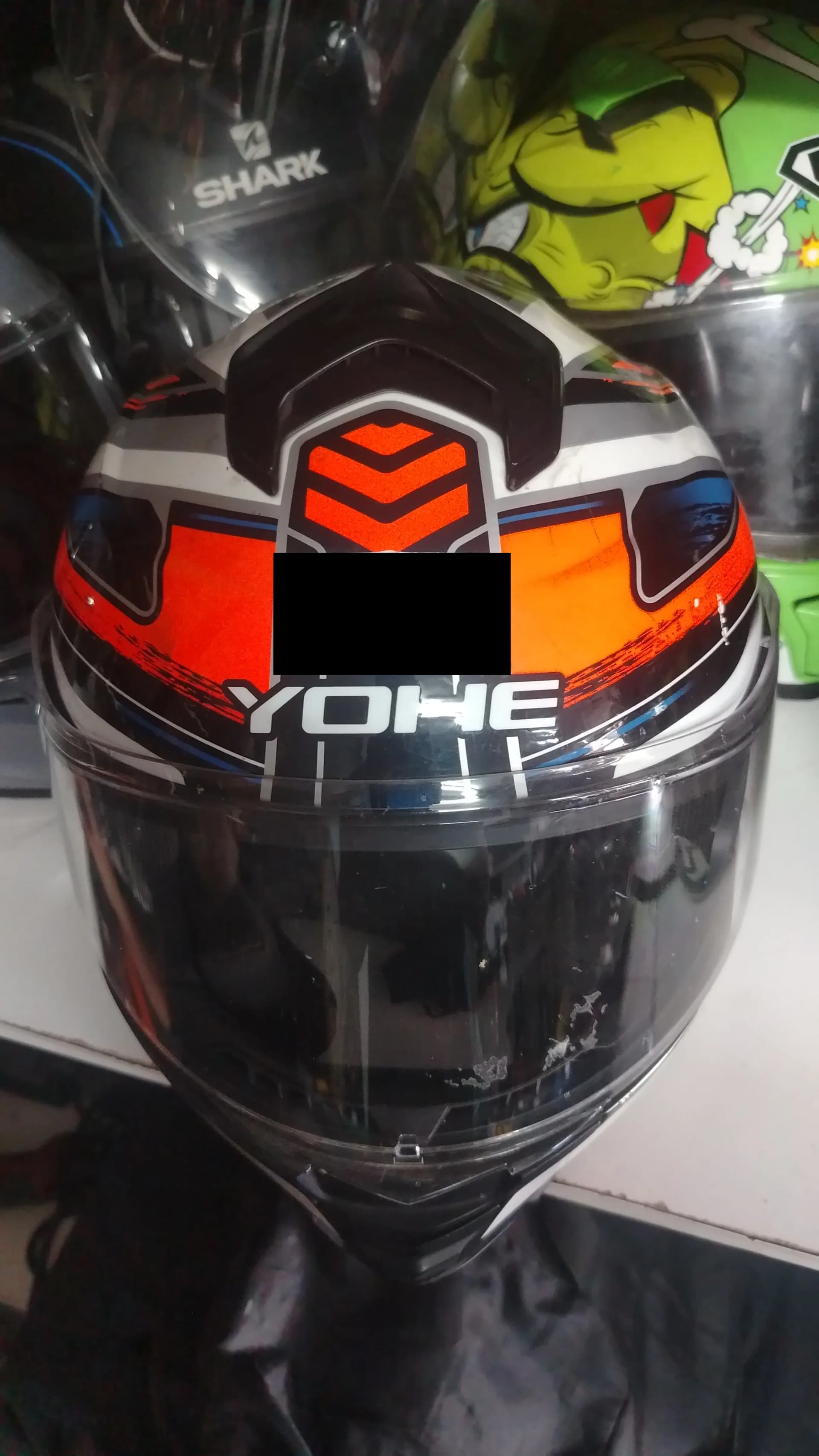 Front of a used Yohe size L motorcycle helmet